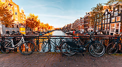 Bicycles-parked-on-a-bridge-in-Amsterdam-reduced